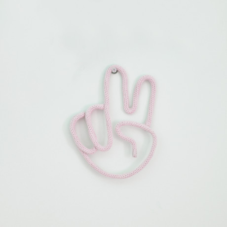 Knitted peace hand sign