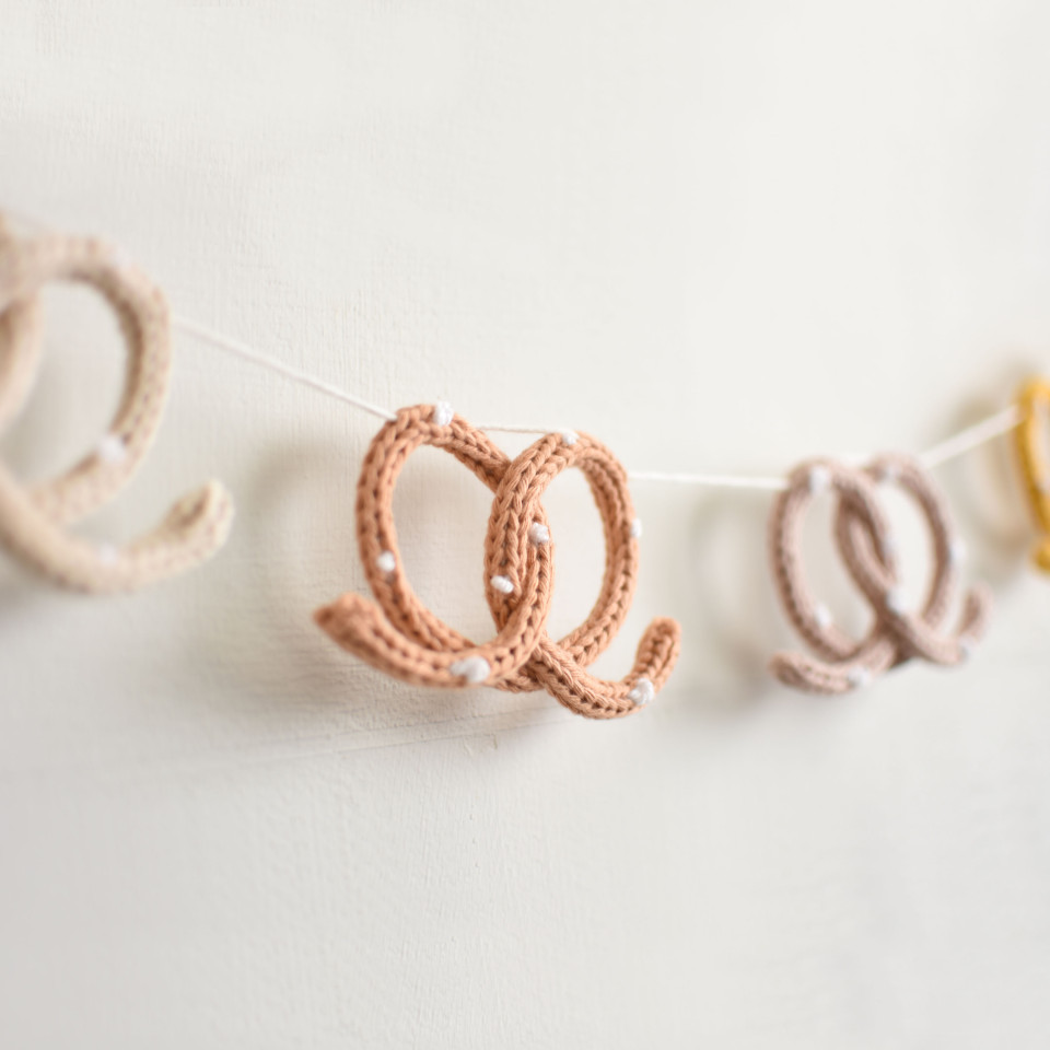 Knitted pretzel garland